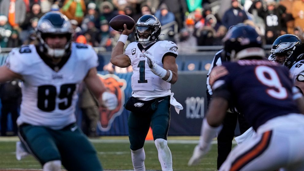 Philadelphia Eagles' Jalen Hurts passes during the second half of an NFL football game against the Chicago Bears, Sunday, Dec. 18, 2022, in Chicago. (AP Photo/Nam Y. Huh)
