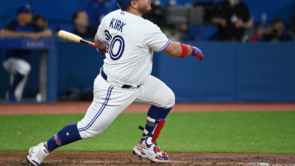 Toronto Blue Jays' Alejandro Kirk watches his two-run home run against the Chicago White Sox during the fifth inning of a baseball game Tuesday, May 31, 2022, in Toronto. (Jon Blacker/The Canadian Press via AP)