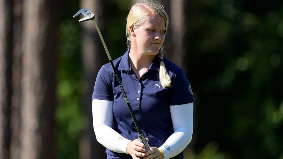 Ingrid Lindblad, of Sweden, watches a putt on the 10th hole during the first round of the U.S. Women's Open golf tournament at the Pine Needles Lodge & Golf Club in Southern Pines, N.C. on Thursday, June 2, 2022. (AP Photo/Chris Carlson)