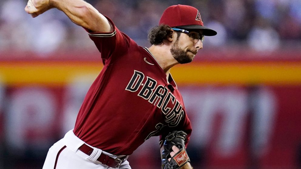 Arizona Diamondbacks starting pitcher Zac Gallen throws against the Milwaukee Brewers during the first inning of a baseball game Sunday, Sept. 4, 2022, in Phoenix. (AP Photo/Ross D. Franklin)