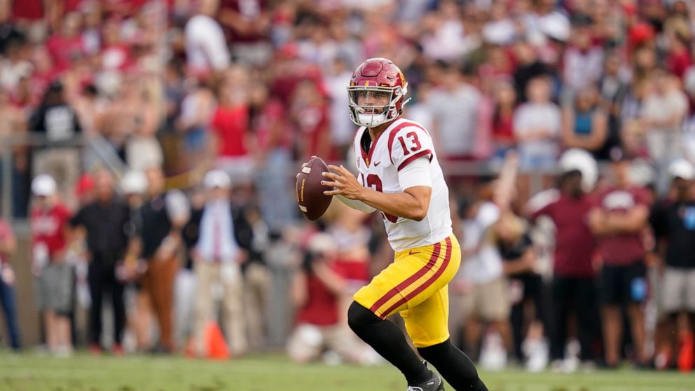 Southern California quarterback Caleb Williams (13) looks to pass against Stanford during the first half of an NCAA college football game in Stanford, Calif., Saturday, Sept. 10, 2022. (AP Photo/Godofredo A. Vásquez)
