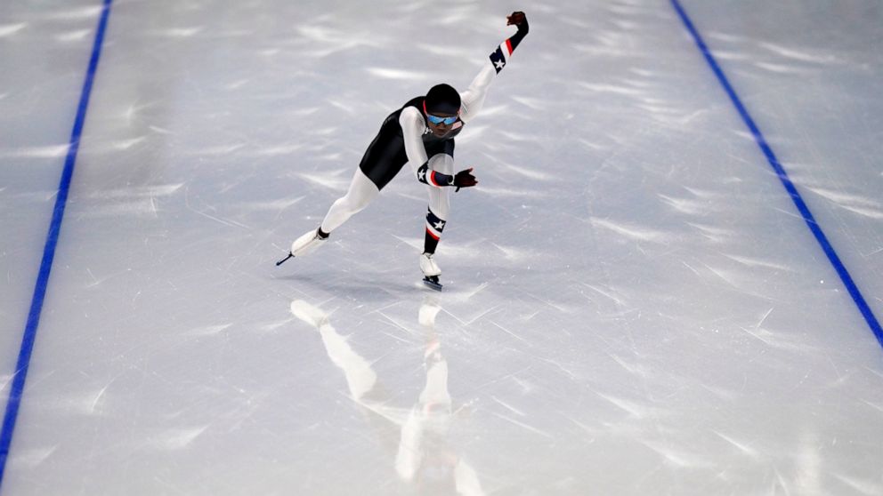 Erin Jackson of the United States skates during a speedskating practice session at the 2022 Winter Olympics, Wednesday, Feb. 9, 2022, in Beijing. (AP Photo/Gerald Herbert)