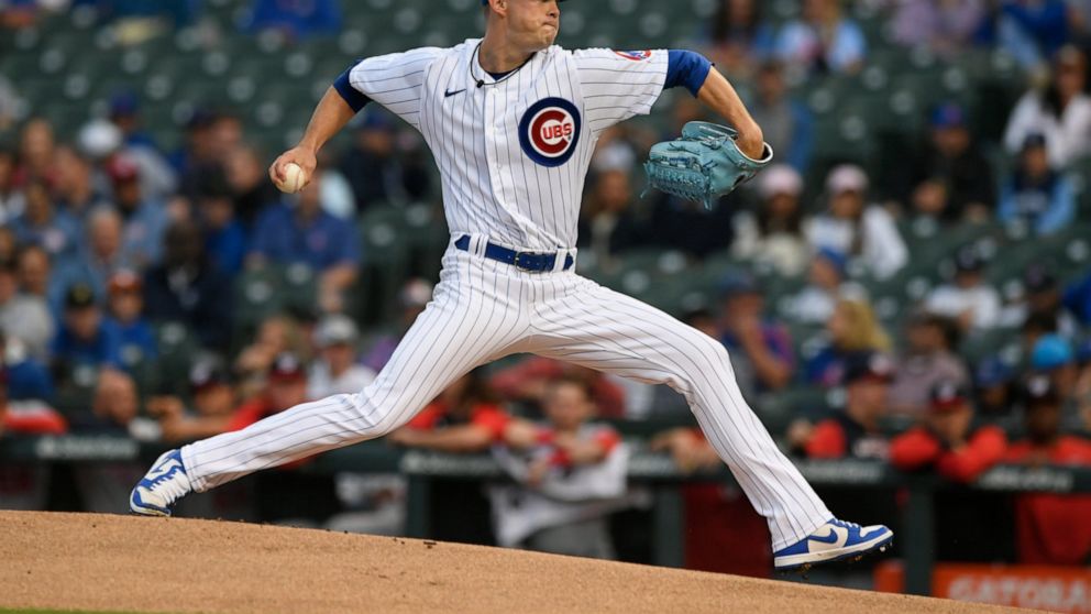 Chicago Cubs starter Keegan Thompson delivers a pitch during the first inning of a baseball game against the Washington Nationals Monday, Aug. 8, 2022, in Chicago. (AP Photo/Paul Beaty)