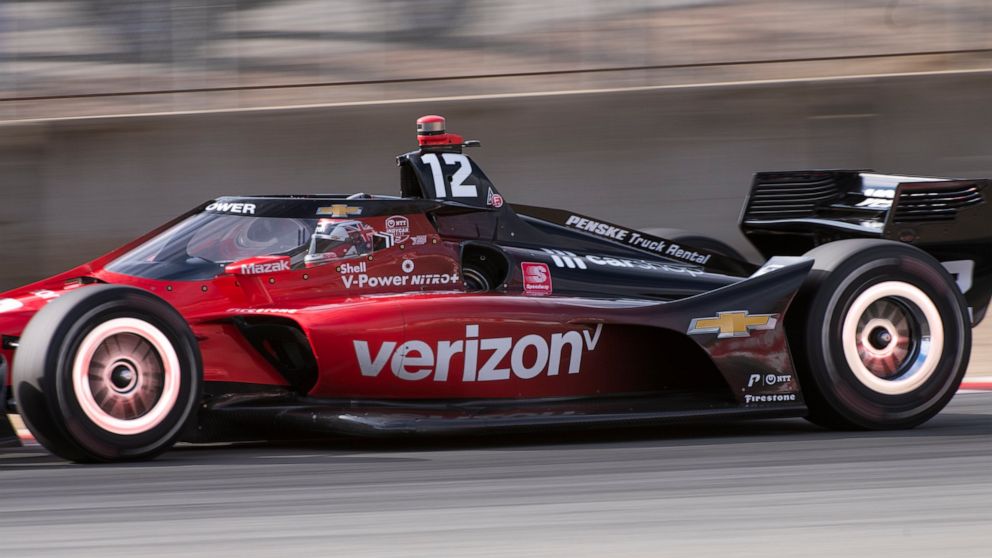 Team Penske driver Will Power (12), of Australia, speeds out of turn 3 during morning warmup for the IndyCar season finale auto race at Laguna Seca Raceway on Sunday, Sept. 11, 2022, Monterey, Calif. (AP Photo/Nic Coury)