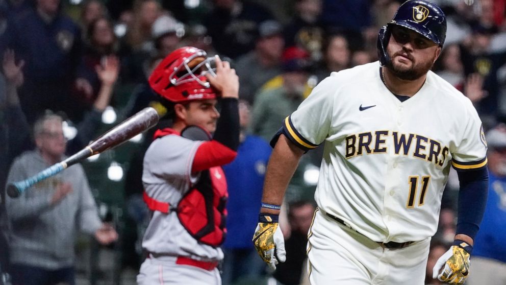 Milwaukee Brewers' Rowdy Tellez hits a two-run home run during the sixth inning of a baseball game against the Cincinnati Reds Wednesday, May 4, 2022, in Milwaukee. (AP Photo/Morry Gash)