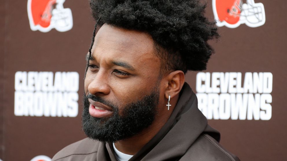 FILE - This is a June 4, 2019, file photo, showing Cleveland Browns wide receiver Jarvis Landry answering questions at the team's NFL football training facility in Berea, Ohio. Landry called reports about teammates being upset with quarterback Baker 