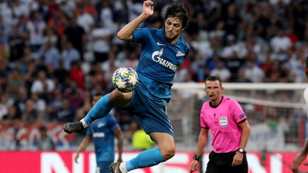 FILE - Zenit's Sardar Azmoun goes for the ball during the group G Champions League soccer match between Lyon and Zenit St Petersburg at the Lyon Olympic Stadium in Lyon, France, Tuesday, Sept. 17, 2019. Iran forward Sardar Azmoun is a doubt for the W