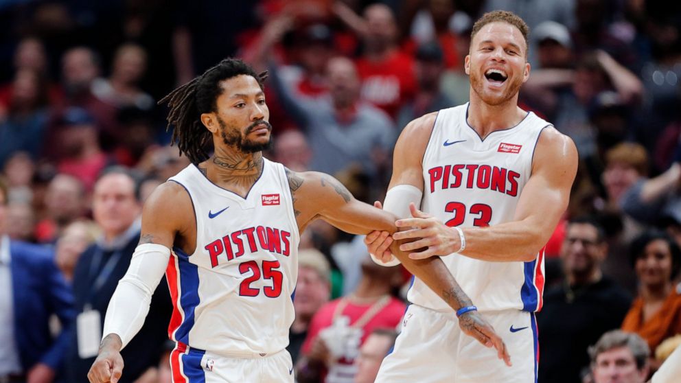 Detroit Pistons guard Derrick Rose (25) celebrates the game winning score with forward Blake Griffin (23) in the second half of an NBA basketball game in New Orleans, Monday, Dec. 9, 2019. (AP Photo/Brett Duke)