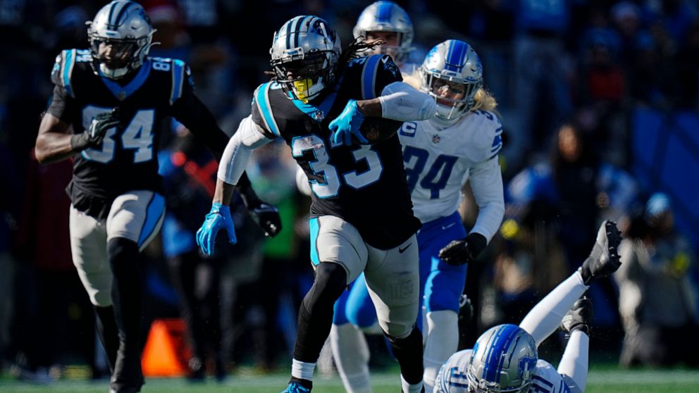 Carolina Panthers running back D'Onta Foreman runs during the first half of an NFL football game between the Carolina Panthers and the Detroit Lions on Saturday, Dec. 24, 2022, in Charlotte, N.C. (AP Photo/Rusty Jones)