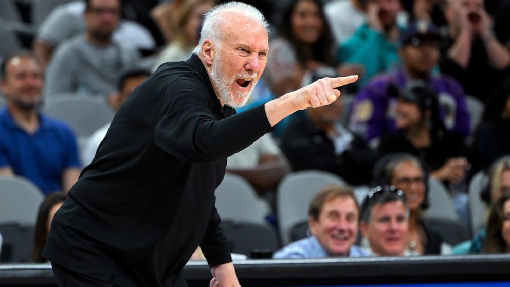 San Antonio Spurs head coach Gregg Popovich yells to his players during the second half of an NBA basketball game against the Cleveland Cavaliers, Monday, Dec. 12, 2022, in San Antonio. San Antonio won 112-111. (AP Photo/Darren Abate)