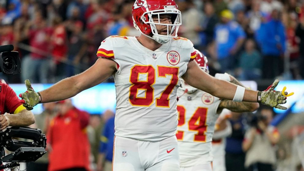 Kansas City Chiefs tight end Travis Kelce celebrates a touchdown during the second half of an NFL football game against the Los Angeles Chargers Sunday, Nov. 20, 2022, in Inglewood, Calif. (AP Photo/Jae C. Hong)