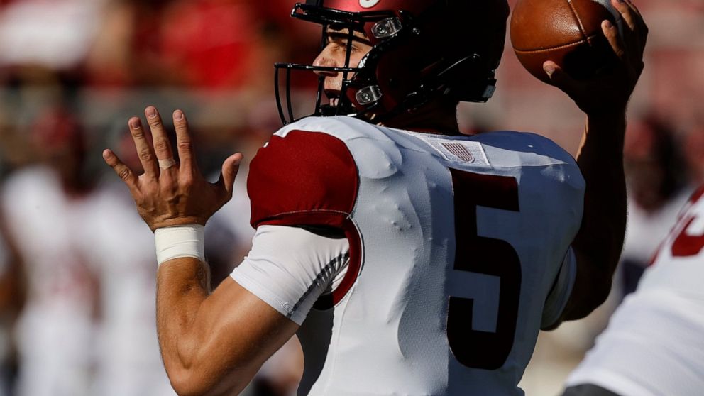 Colgate quarterback Michael Brescia (5) looks to throw the ball against Stanford in the first quarter of an NCAA college football game in Stanford, Calif., Saturday, Sept. 3, 2022. (AP Photo/Josie Lepe)