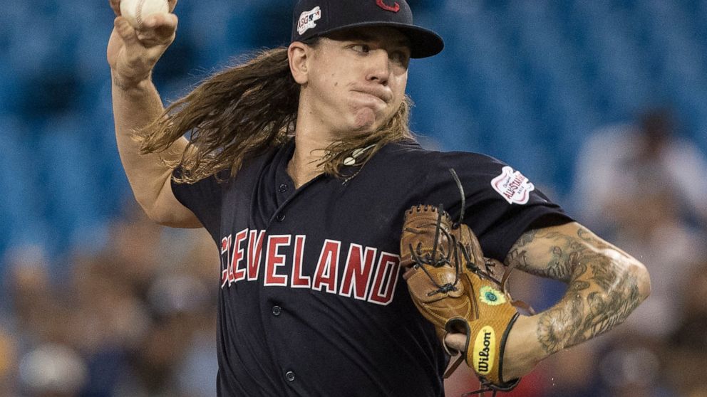 Cleveland Indians starting pitcher Mikel Clevinger throws against the Toronto Blue Jays during first-inning baseball game action in Toronto, Monday, July 22, 2019. (Fred Thornhill/The Canadian Press via AP)