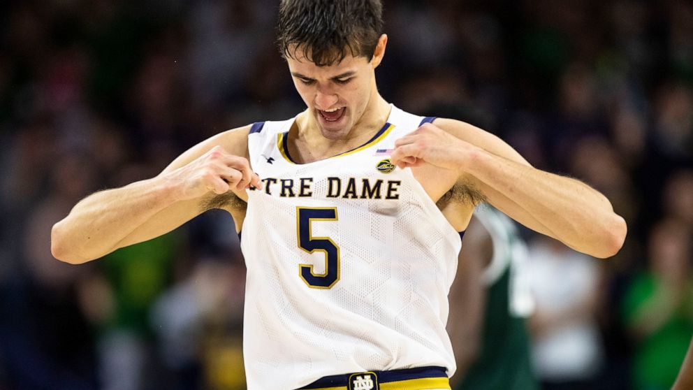 Notre Dame's Cormac Ryan celebrates during the first half of the team's NCAA college basketball game against Michigan State on Wednesday, Nov. 30, 2022, in South Bend, Ind. (AP Photo/Michael Caterina)