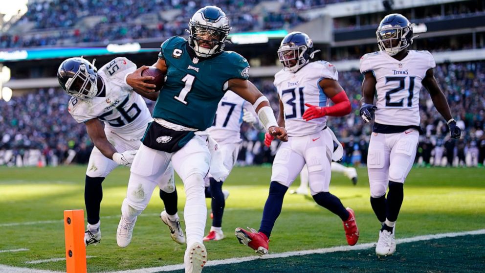 Philadelphia Eagles' Jalen Hurts scores a touchdown during the first half of an NFL football game against the Tennessee Titans, Sunday, Dec. 4, 2022, in Philadelphia. (AP Photo/Matt Rourke)