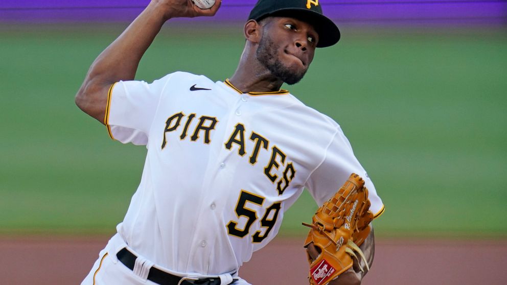 Pittsburgh Pirates starting pitcher Roansy Contreras delivers during the first inning of a baseball game against the Chicago Cubs in Pittsburgh, Tuesday, June 21, 2022. (AP Photo/Gene J. Puskar)