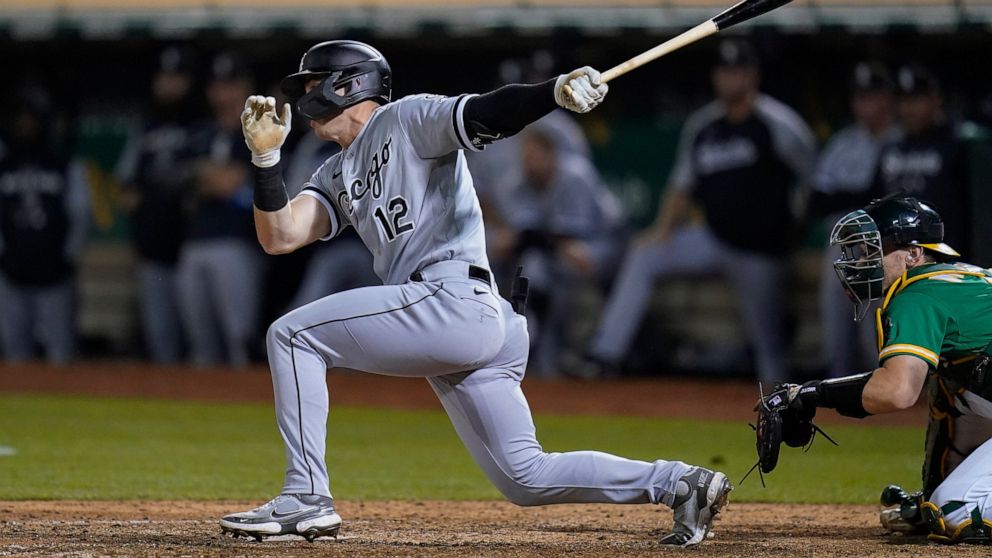 Chicago White Sox's Romy Gonzalez follows through on an RBI single against the Oakland Athletics during the ninth inning of a baseball game in Oakland, Calif., Friday, Sept. 9, 2022. (AP Photo/Godofredo A. Vásquez)