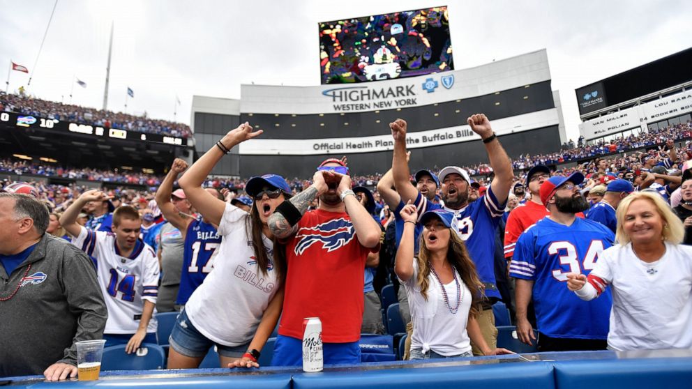 Fans cheer during the second half of an NFL football game between the Buffalo Bills and the Pittsburgh Steelers in Orchard Park, N.Y., Sunday, Sept. 12, 2021. (AP Photo/Joshua Bessex)