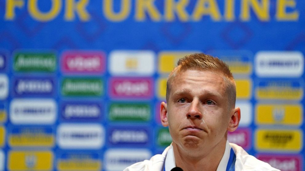 Ukraine's Oleksandr Zinchenko reacts, during a press conference, at Hampden Park, in Glasgow, Scotland, Tuesday May 31, 2022. Scotland will play Ukraine in a World Cup qualifier soccer match on Wednesday. (Andrew Milligan/PA via AP)