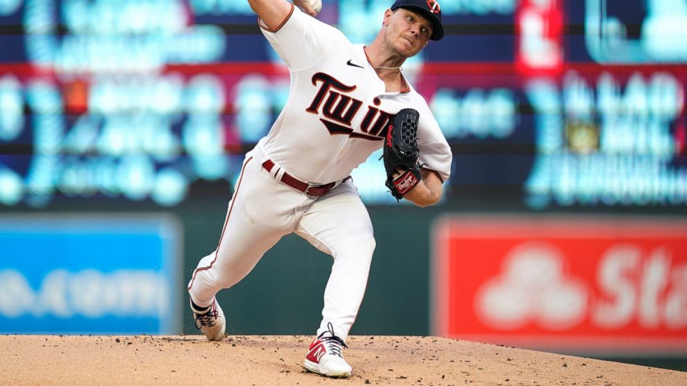 Minnesota Twins starting pitcher Sonny Gray delivers to a Kansas City Royals batter during the first inning of a baseball game Tuesday, Aug. 16, 2022, in Minneapolis. (AP Photo/Abbie Parr)
