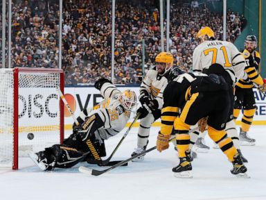 DeBrusk scores 2 in 3rd, Bruins beat Pens in Winter Classic