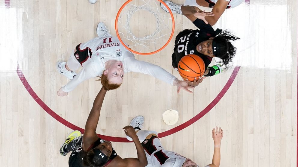 Stanford forward Ashten Prechtel (11) and South Carolina forward Sania Feagin (20) compete for a rebound during the first half of an NCAA college basketball game in Stanford, Calif., Sunday, Nov. 20, 2022. (AP Photo/Godofredo A. Vásquez)