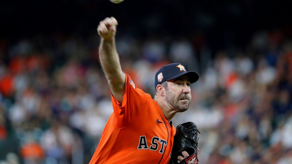 Houston Astros starting pitcher Justin Verlander throws to a Seattle Mariners batter during the first inning of a baseball game Friday, July 29, 2022, in Houston. (AP Photo/Michael Wyke)