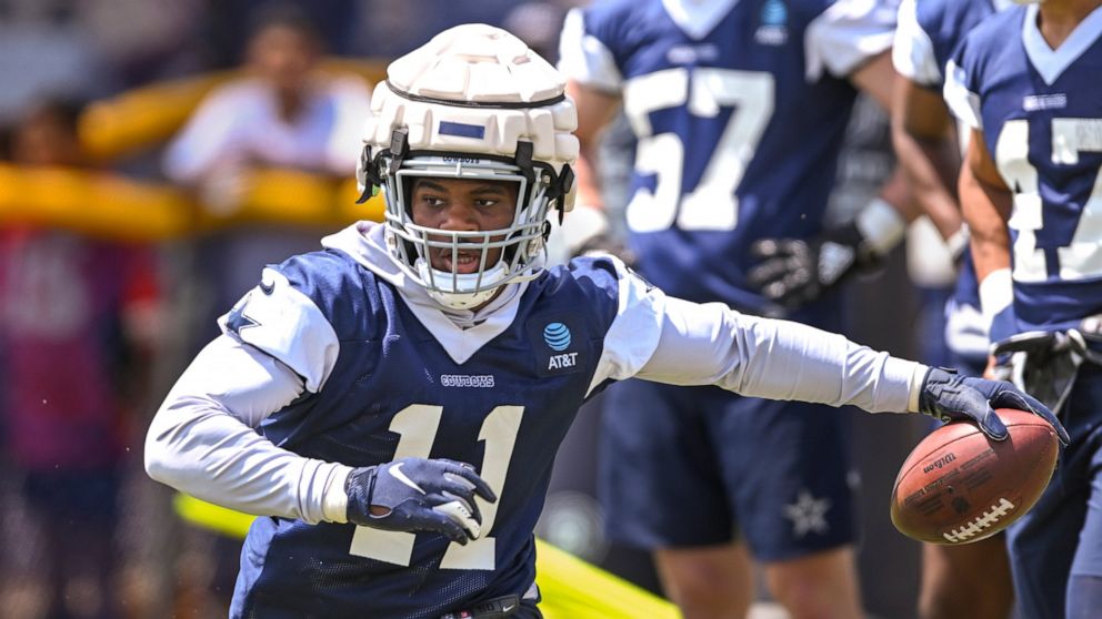 FILE - Dallas Cowboys linebacker Micah Parsons runs a drill during NFL football training camp Wednesday, July 27, 2022, in Oxnard, Calif. Parsons' pass rushing played a huge role in the Dallas linebacker winning NFL Defensive Rookie of the Year honor