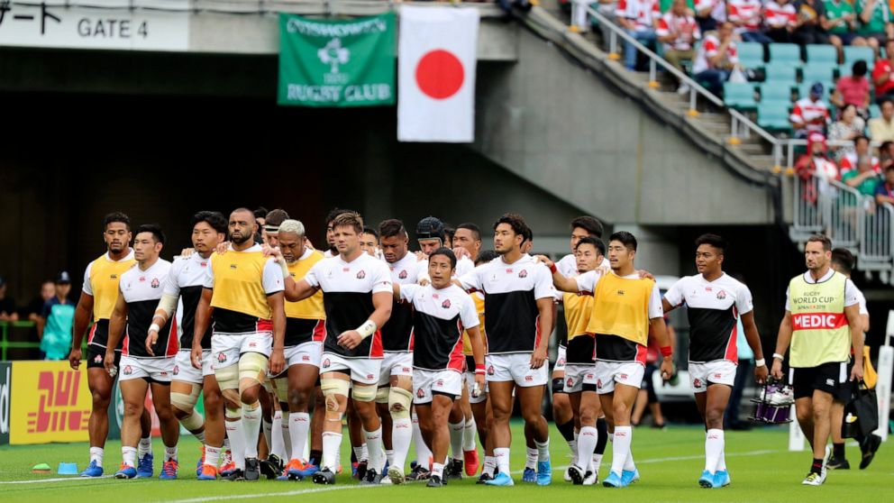 FILE - In this Sept. 28, 2019 file photo, the Japan team leave the field after a warm up ahead of the Rugby World Cup Pool A game at Shizuoka Stadium Ecopa against Ireland in Shizuoka, Japan. Japan will play South Africa in a quarterfinal in Tokyo on