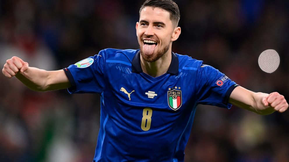 Italy's Jorginho celebrates after scoring the last penalty kick during the Euro 2020 soccer championship semifinal match against Spain at Wembley stadium in London, England, Tuesday, July 6, 2021. Jorginho converted the decisive penalty kick Tuesday 