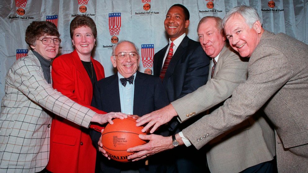 FILE - Inductees to the Basketball Hall of Fame pose at a news conference in New York, Feb. 4, 1997. From left are Joan Crawford of Nashville, Tenn.; Denise Curry of UCLA; Pete Carril of Princeton; Alex English of the Denver Nuggets; Don Haskins of U