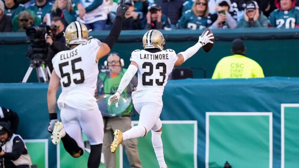 New Orleans Saints cornerback Marshon Lattimore (23) returns an interception for a touchdown in the second half of an NFL football game against the Philadelphia Eagles in Philadelphia, Sunday, Jan. 1, 2023. (AP Photo/Matt Rourke)