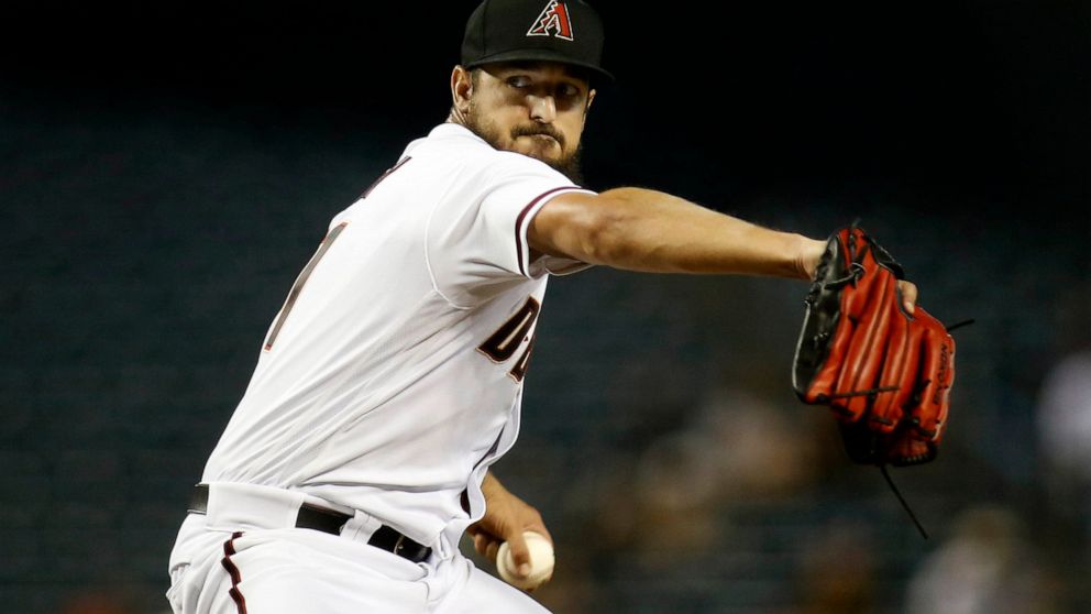 Arizona Diamondbacks pitcher Caleb Smith delivers against the Pittsburgh Pirates during the first inning of a baseball game Monday, July 19, 2021, in Phoenix. (AP Photo/Darryl Webb)