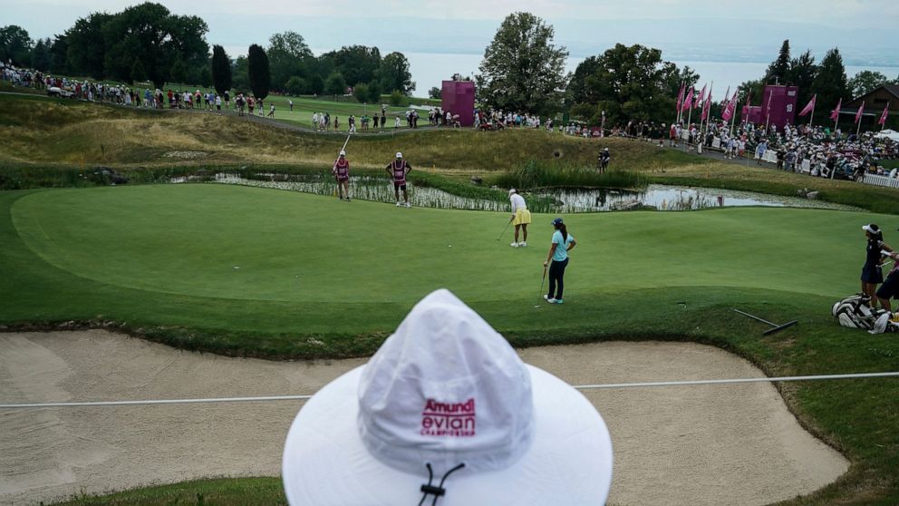 So Yeon Ryu, of South Korea, follows her ball after playing on the 16th hole during the Evian Championship women's golf tournament in Evian, eastern France, Saturday, July 23, 2022. (AP Photo/Laurent Cipriani)