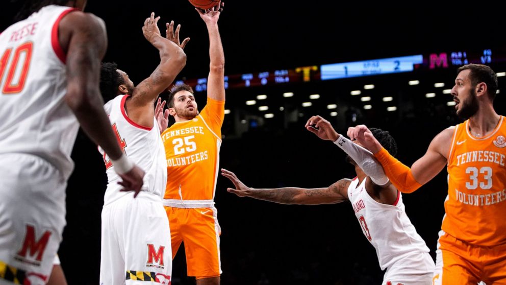 Tennessee guard Santiago Vescovi (25) goes up to shoot during the first half of an NCAA college basketball game against Maryland in the Basketball Hall of Fame Invitational, Sunday, Dec. 11, 2022, in New York. (AP Photo/Julia Nikhinson)