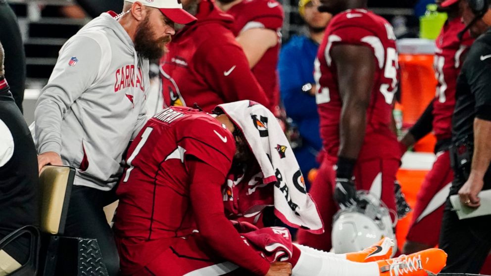 Arizona Cardinals quarterback Kyler Murray (1) is brought off the field after an injury during the first half of an NFL football game against the New England Patriots, Monday, Dec. 12, 2022, in Glendale, Ariz. (AP Photo/Darryl Webb)