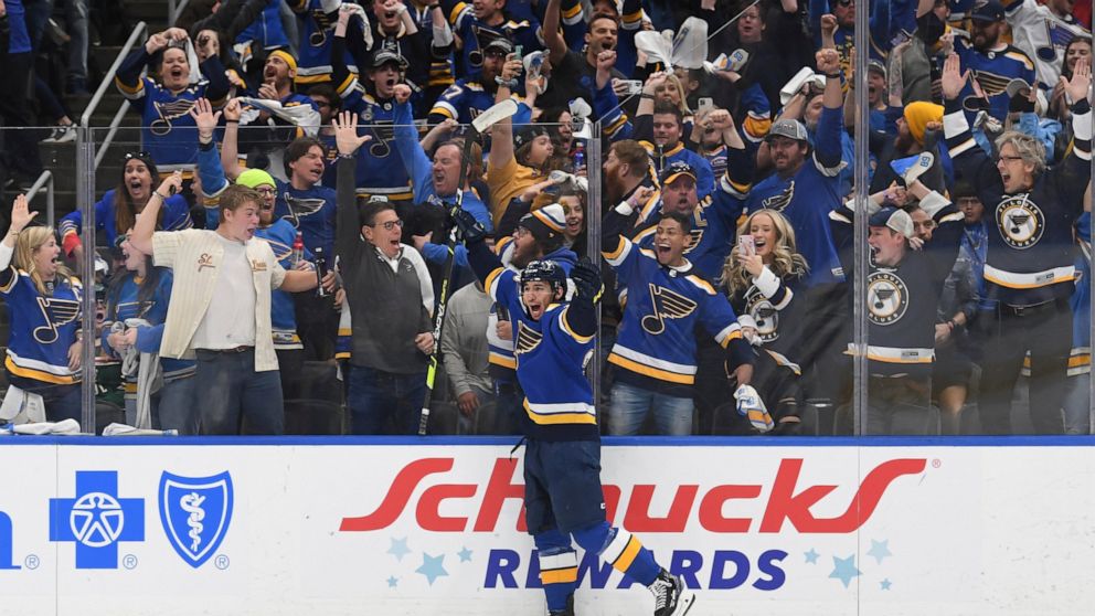 St. Louis Blues' Jordan Kyrou (25) celebrates after scoring a goal during the second period in Game 4 of an NHL hockey Stanley Cup first-round playoff series against the Minnesota Wild, Sunday, May 8, 2022, in St. Louis. (AP Photo/Michael Thomas)