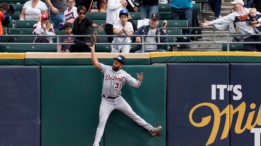 Detroit Tigers center fielder Riley Greene (31) catches a ball hit by Chicago White Sox's Andrew Vaughn during the fourth inning of a baseball game Sunday, Sept. 25, 2022, in Chicago. (AP Photo/David Banks)