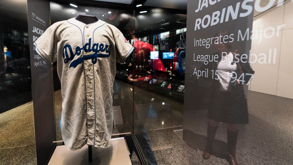 A jersey of Jackie Robinson is displayed at the National Museum of African American History and Culture in Washington, commemorating the 75th anniversary of Jackie Robinson's integration of Major League Baseball, Thursday, April 7, 2022. Robinson bec