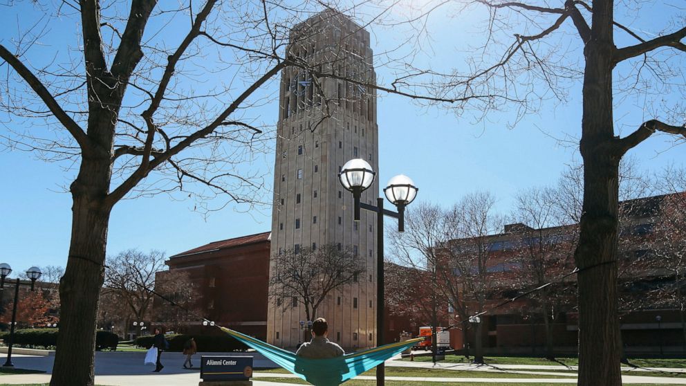FILE - This April 7, 2017 file photo, shows Burton Tower on the University of Michigan campus in Ann Arbor, Mich. Several former patients have alleged that Robert E. Anderson, a late University of Michigan physician, sexually abused them during exams