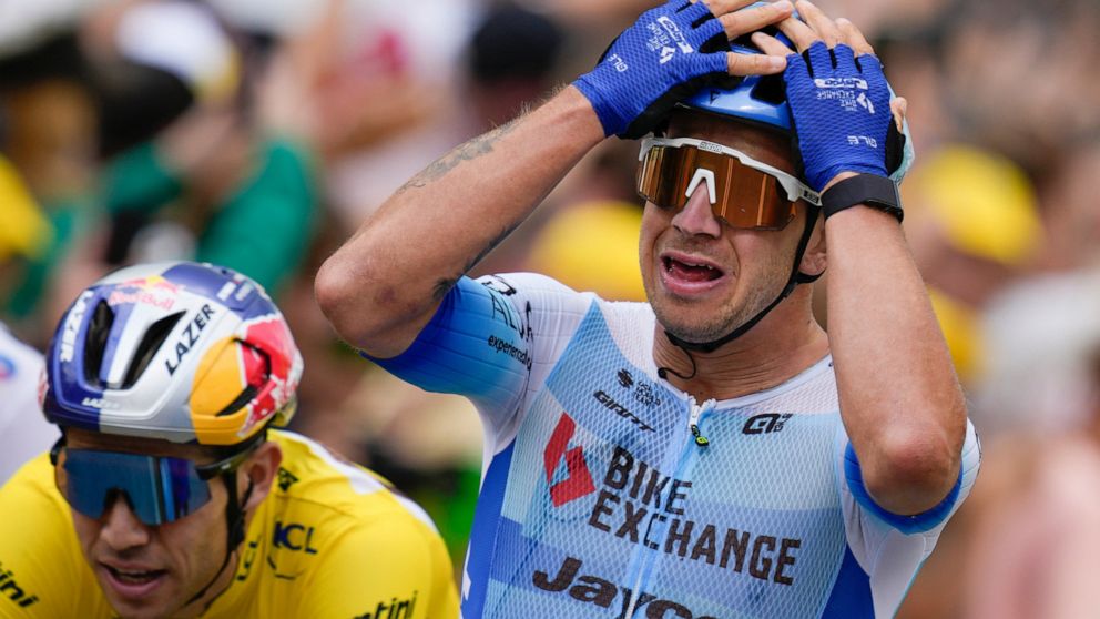 Stage winner Netherlands' Dylan Groenewegen crosses the finish line ahead of second placed Belgium's Wout Van Aert during the third stage of the Tour de France cycling race over 182 kilometers (113 miles) with start in Vejle and finish in Sonderborg,