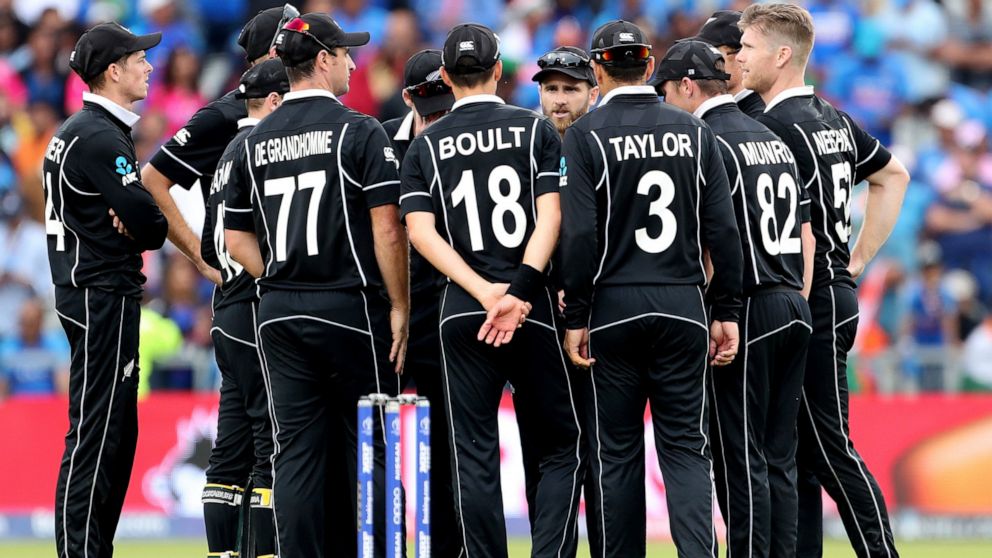 New Zealand players celebrate their win over India in the Cricket World Cup semi-final match at Old Trafford in Manchester, England, Wednesday, July 10, 2019. (AP Photo/Aijaz Rahi)