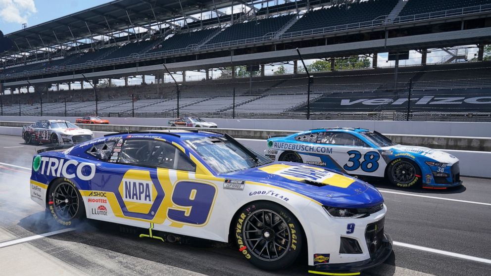 Chase Elliott leaves the pits during a NASCAR Cup Series auto race at Indianapolis Motor Speedway, Sunday, July 31, 2022, in Indianapolis. (AP Photo/Darron Cummings)