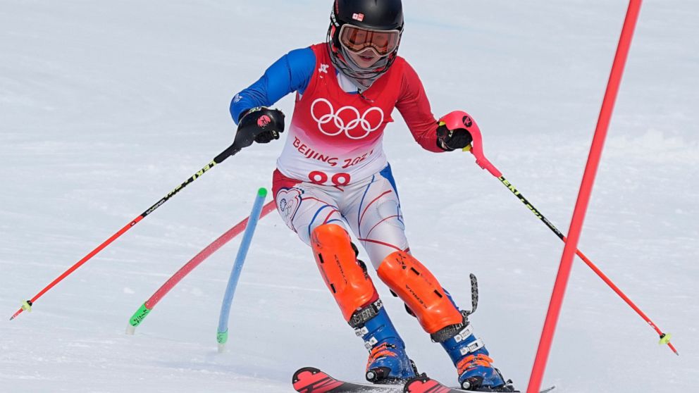 Lee Wen-Yi, of Taiwan passes a gate during the second run of the women's slalom at the 2022 Winter Olympics, Wednesday, Feb. 9, 2022, in the Yanqing district of Beijing. (AP Photo/Robert F. Bukaty)
