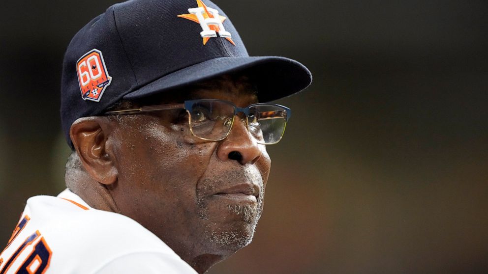 Houston Astros manager Dusty Baker Jr. looks at the scoreboard during the second inning of a baseball game against the Seattle Mariners Tuesday, May 3, 2022, in Houston. (AP Photo/David J. Phillip)