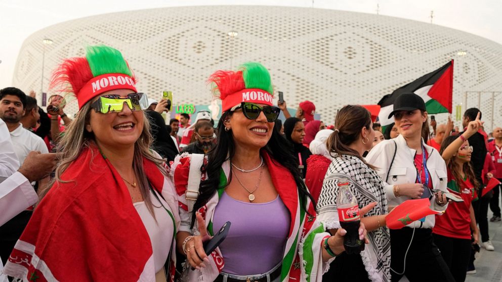 FILE - Female Morocco fans arrive at the stadium before the World Cup quarterfinal soccer match between Morocco and Portugal, at Al Thumama Stadium in Doha, Qatar, Saturday, Dec. 10, 2022. (AP Photo/Ebrahim Noroozi, File)