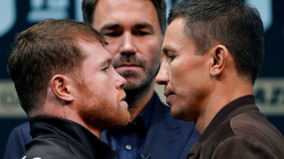 Canelo Alvarez, left, and Gennady Golovkin, right, pose during a news conference Thursday, Sept. 15, 2022, in Las Vegas. The two are scheduled to fight in a super middleweight title bout Saturday in Las Vegas. (AP Photo/John Locher)