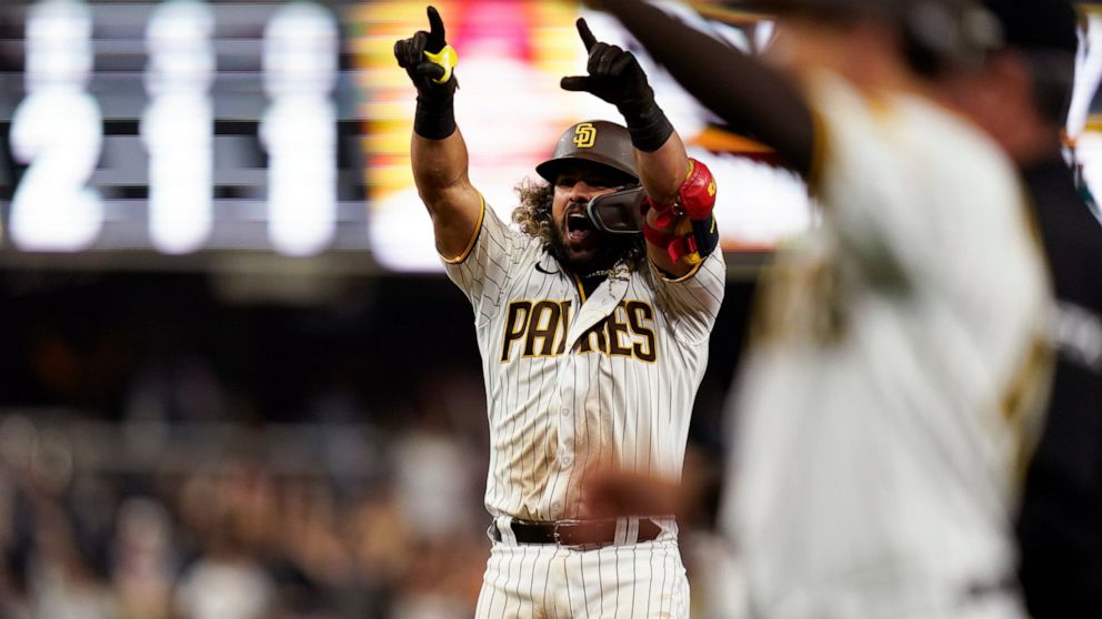 San Diego Padres' Jorge Alfaro reacts after hitting a walk off single during the eleventh inning of a baseball game against the Arizona Diamondbacks, Tuesday, June 21, 2022, in San Diego. The Padres won, 3-2. (AP Photo/Gregory Bull)