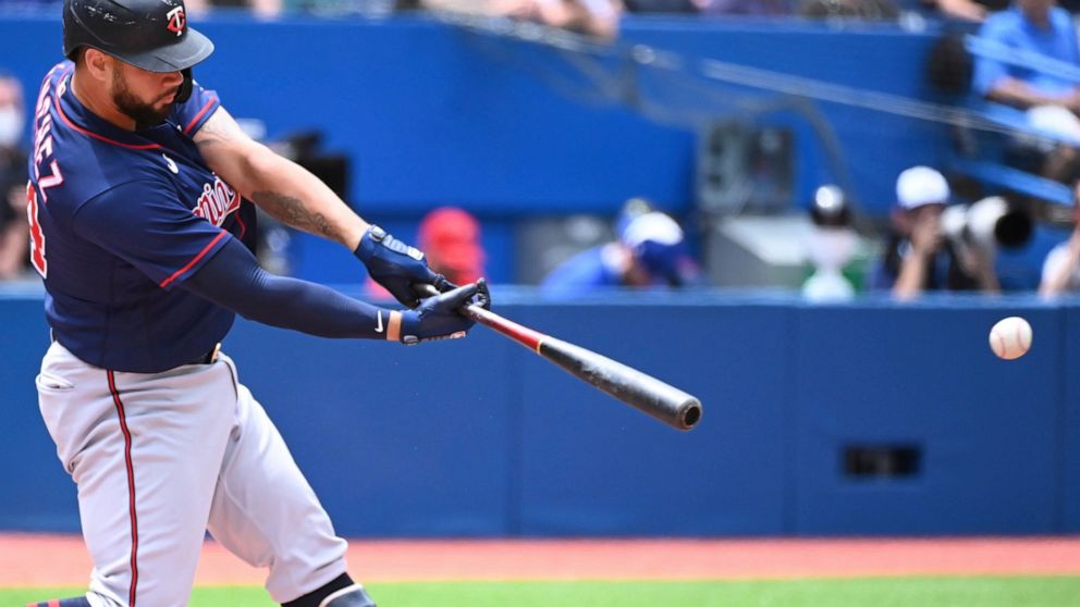 Minnesota Twins' Gary Sanchez hits a single against the Toronto Blue Jays in the first inning of a baseball game in Toronto, Sunday, June 5, 2022. (Jon Blacker/The Canadian Press via AP)
