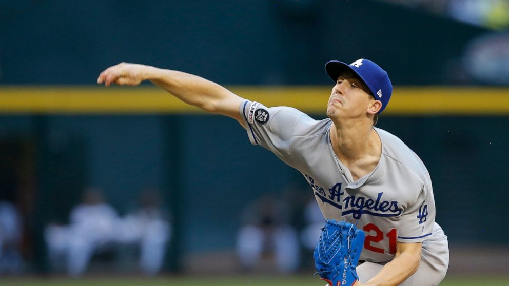 Los Angeles Dodgers pitcher Walker Buehler throws in the first inning of a baseball game against the Arizona Diamondbacks, Monday, June 3, 2019, in Phoenix. (AP Photo/Rick Scuteri)